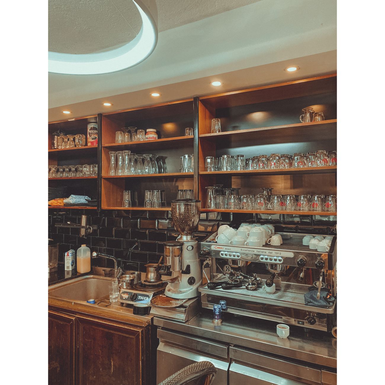 Shelves displaying vintage household goods